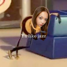 a girl with long brown hair is standing in front of a blue suitcase and has the words ya like jazz on it