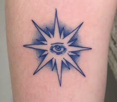 a tattoo with an all seeing eye on it