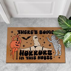 a door mat that says, there's some horrors in this house