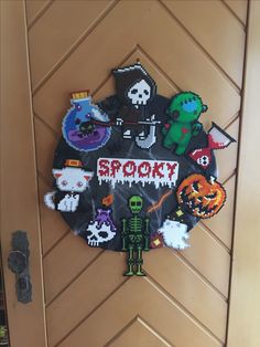 a door decorated with halloween stickers and an image of spooky on it