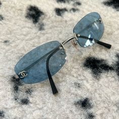 Iconic Chanel 4002 Rimless Cc Logo 90’s Sunglasses. Total Off-Duty 90’s Y2k Supermodel Vibes. Seen On All Of Your Favorite Celebs - Must Have For The Summer! Sunglasses Are In Great Condition! (Case Is Not) Message With Questions; Offers Are Always Welcome! #Chanel #Iconic #Timeless #Trending #Preppy Y2k Supermodel, Vintage Chanel Sunglasses, 90s Chanel, Fancy Glasses, Chanel Blue, Designer Sunglasses For Women, Y2k Sunglasses, Silver Sunglasses, Y2k Accessories