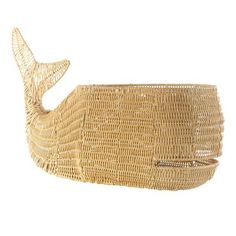 the basket is made out of straw and has a large whale shaped handle on it