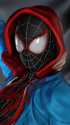 a man in a blue hoodie with a red spider - man on his face