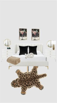 the bedroom is decorated in white and black with leopard print rugs on the floor