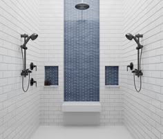 a white tiled bathroom with two shower heads