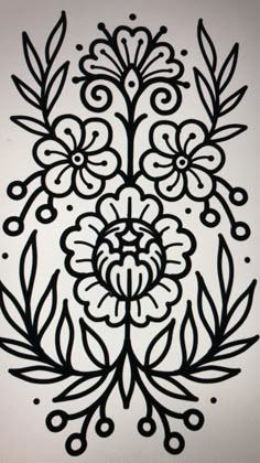 a black and white drawing of flowers with leaves on it's side, in the middle