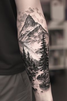 Explore 80 epic mountain tattoo ideas that will elevate your ink to the next level. These designs include simple mountain and tree tattoos for the forearm, sleeve, shoulder, and back, as well as mountain and sun tattoos that shine on the ankle or arm. Whether you’re drawn to geometric and fine line mountain and wave tattoos, minimalist or colored designs, or matching couple tattoos, these ideas are perfect for both men and women. Find inspiration in these meaningful and beautiful tattoos. Mountain Calf Tattoo Men, Outdoor Forearm Tattoo Men, Tree Calf Tattoo Men, Waterfall Mountain Tattoo, Nature Arm Tattoo For Men, Tattoo Half Sleeve Women Forearm, Mountain Tattoo Cover Up Ideas, Tattoo Sleeve Mountains, Men Nature Tattoo Ideas