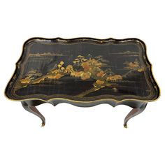 19th Century English Chinoiserie lacquered table. Table has one drawer. Hand-painted Chinese landscape in rich colors of gold, mossy green, and brown on a black background. Curved legs are are black lacquered wood culminating into gold embellished feet. This table will make a fine accent piece for a beautiful home. Lacquered Table, Chinoiserie Table, Mossy Green, Chinese Landscape, Lacquered Wood, Table Table, Rich Colors, Rococo, Beautiful Home