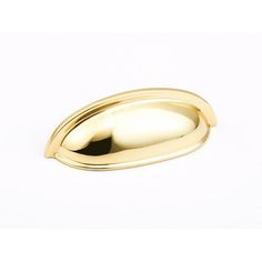 an oval gold object on a white background