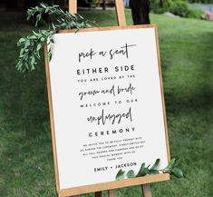 an easel with a sign that says pick a seat, either side you are loved by the groom and bride