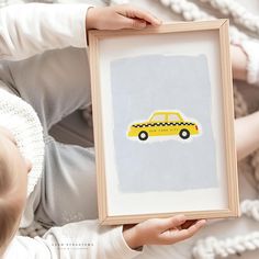 Bring the bustling streets of New York into your little one's room with this fun NYC Taxi Kids Wall Art! Featuring a bright yellow taxi cab against a soft blue-grey background, this playful printable wall art is perfect for any boys' room, nursery, or playroom with a transportation or city theme. The bold colours and minimalist design make it an easy fit for modern decor while sparking a sense of adventure and fun. * You receive 2 PDFs: one that links you to all the multiple file sizes for this Nyc Nursery Theme, Transportation Nursery, Nyc Taxi, Wall Art Yellow, City Theme, Yellow Taxi, Yellow Cabs, Boys Room Wall Art, Kids Print