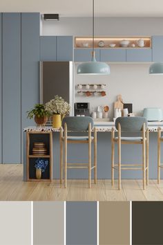 an image of a kitchen with blue and gray colors in the cabinets, counter tops, and bar stools