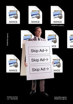 a man holding up a sign that says skip ad, skip ad and ski ad