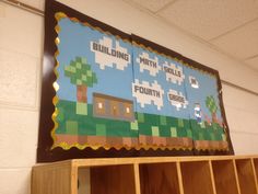 a bulletin board is hanging on the wall in front of a book shelf with books