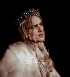 a man with long blonde hair wearing a tiara and fur coat, looking to the side