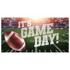 a football on the field with it's game day message