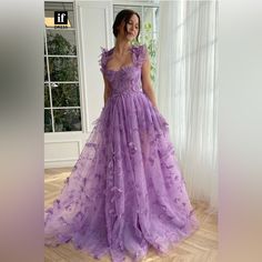 Size 14, Never Worn, Lavender Formal Dress With Butterflies, Tulle & Satin Fabric, A-Line & Has A Slit Purple Butterfly Dress Prom, Purple Prom Dress Flowers, Lavender Sparkly Dress, Light Lavender Wedding Dress, Sweet 16 Dress Purple, Tangled Sweet 16 Dress, Lilac Wedding Dress Bridesmaids, Prom Dress Inspiration Purple, Tangled Inspired Dress