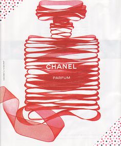 chanel parfum perfume bottle with pink ribbon in front of it and an advert