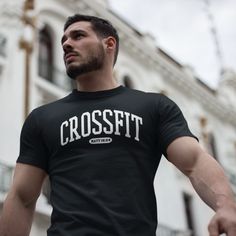 This Christian gym t shirt gives Crossfit a whole different meaning. Matthew 16:24 ask us to pick up our cross and follow Jesus. Be a billboard for Christ during your workout at the gym and spread the Gospel everywhere you go. Color Options: Black  - 100% combed and ring-spun cotton - Fabric weight: 4.4 oz  - Shoulder-to-shoulder taping - Side-seamed Christian Gym, Crossfit Tshirts, Crossfit Shirts, Gym Tshirt, Gym T Shirt, Matthew 16, Workout At The Gym, Spread The Gospel, Gym Tees