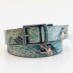 This beautiful leather belt is  handmade from Full Grain Vegetable tanned leather and features a printed patterned of vintage dragons.  This belt can be personalised too - You can sneak in a secret message on the back,  You can get to choose the finishing touch too! Fancy an antique nickel buckle like the one you've seen in the pictures? Or maybe antique brass is more your style? Just drop me a note in the "Notes to Seller" after purchasing his belt.  🌟 Lovingly handcrafted by  ️ in my UK home Vintage Dragon, Custom Belt, Suspender Belt, Vegetable Tanned Leather, Belt Size, Gift For Him, Leather Belt, Antique Brass, Gifts For Him