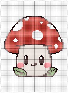 a cross stitch pattern with a red mushroom on it's face and green leaves