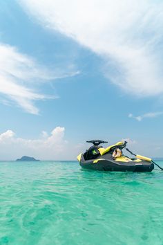 a jet ski in the middle of clear blue water