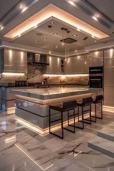 a large kitchen with marble counter tops and bar stools in the middle of it