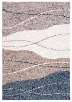 an area rug with waves on it in blue, beige and white colors is shown