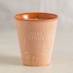 a ceramic cup that says bossy rings on it