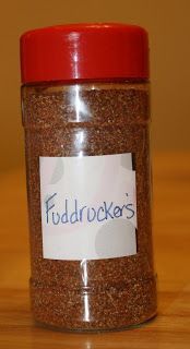 a jar with a label on it that says fuddocker's sitting on a table