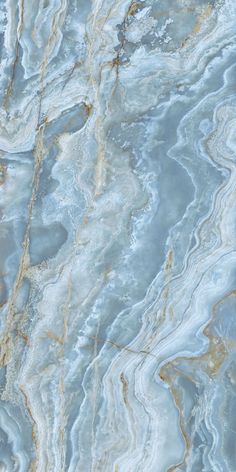 an abstract marble pattern in blue and gold