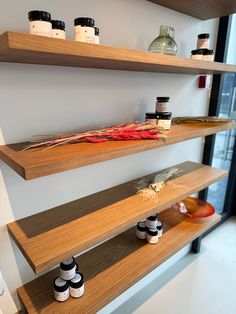 some shelves with bottles and jars on them