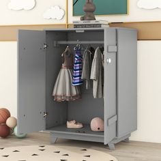 a gray locker with clothes hanging on it