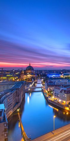 an aerial view of a city at night