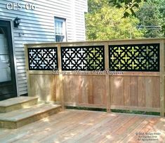 a wooden deck with trellis and steps