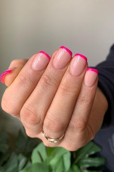 Modern elegance meets playful vibrancy with these natural-looking squoval nails sporting vibrant thin pink tips, a chic twist on the classic French manicure. The perfect subtle statement for your look! 💅🌸 // Photo Credit: Instagram @thegelhouse Bright Pink Tips Nails, Squoval Pink French Tip Nails, Hot Pink French Tip Nails Short, Pink Tip French Manicure, Bright Pink French Tip Nails, Pink French Manicure Nails, Pink Tips Nails, Pink French Mani