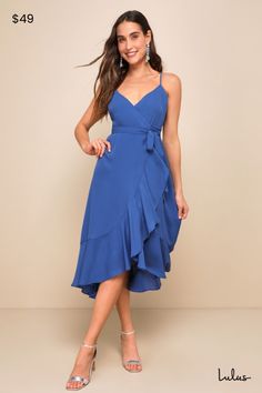 No matter the city your soiree is in, the Lulus Manhattan Moment Blue Ruffled Midi Wrap Dress is your perfect plus one! Lightweight woven fabric sweeps from adjustable spaghetti straps, into a darted bodice atop a midi wrap skit with cascading ruffles that trims the wrap silhouette and the high-low hem. Waist secures via a tying sash belt for an adjustable fit. Fit: This garment fits true to size. Length: Mid-calf length. Size medium measures 42.5" from adjustable straps to hem. Bust: Great for Wedding Guest Outfit Fall, Sleeveless Wrap Dress, Cascading Ruffles, Midi Wrap Dress, Sash Belts, Sash Belt, High Low Hem, Wedding Guest Outfit, Guest Dresses