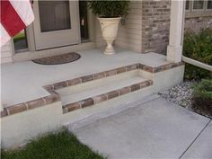 the front porch is clean and ready to be used as a planter for flowers