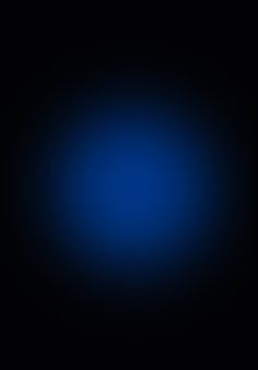 a black and blue background with some light