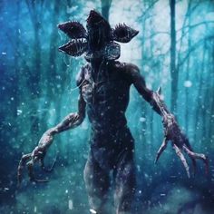 an alien walking through the woods with his hands out in front of him, while it's snowing