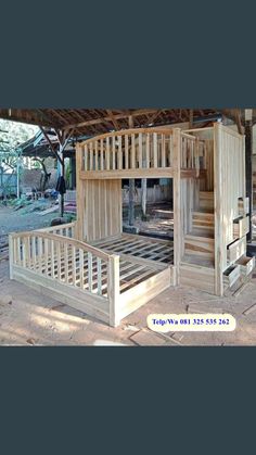 a wooden structure with stairs in the middle