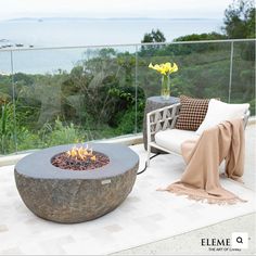 a fire pit sitting on top of a patio