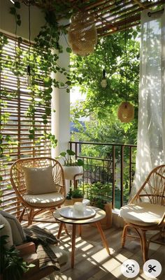 an outdoor patio with wicker furniture and plants