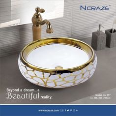 an advertisement for a bathroom sink with gold and white designs on the bowl, which reads beyond a dream beautiful reality