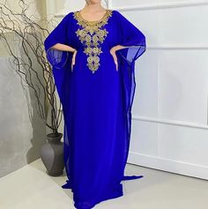 Buy Royal Blue Embroidered Georgette Islamic Kaftan with Zari and Stone Work - African Attire Shop Blue Floor-length Kaftan With Dabka Work, Traditional Royal Blue Long Kaftan, Floor-length Blue Kaftan With Resham Embroidery, Royal Blue Embroidered Kaftan, Blue Resham Embroidery Floor-length Kaftan, African Kaftan, Kaftan Dresses, Moroccan Kaftan, Tassel Dress