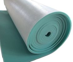 a rolled up yoga mat on top of each other