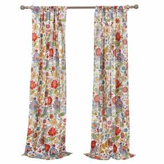 an open window with floral curtains hanging on the side and one curtain pulled down to reveal a white background