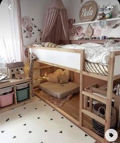 there is a bunk bed in the children's room with no mattresses on it