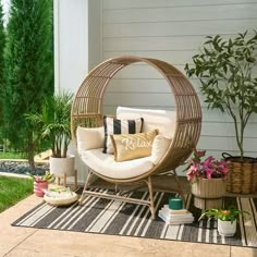 The Better Homes & Gardens Bellamy Round Wicker Outdoor Egg Chair is sure to elevate your relaxation experience. The Better Homes & Gardens Bellamy Round Wicker Outdoor Egg Chair is designed to cradle you in luxurious comfort. Handwoven from durable and weather-resistant wicker, our egg chair is perfect for both indoor and outdoor settings. Sink into the plush cushions, designed for hours of cozy lounging, while the chic, contemporary design adds a touch of elegance to any outdoor space. Whether Egg Furniture, Outdoor Stacking Chairs, Outdoor Wicker Chairs, Basket Chair, Boho Patio, Diy Porch, Chair And Ottoman Set, Porch Garden, Better Homes And Garden