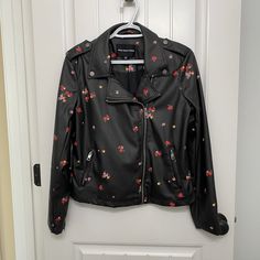 Black Faux Leather Jacket With Fun Flower Print. Zippered Pockets And Sleeves Gives This Jacket A Edgy Look. Worn Once, Practically Brand New. Comes From A Smoke Free Home. Leather Jacket With Patches, Motto Jacket, Jacket With Patches, Jacket Embroidery, Patches Embroidery, Pu Jacket, Black Faux Leather Jacket, Faux Leather Jacket, Edgy Look